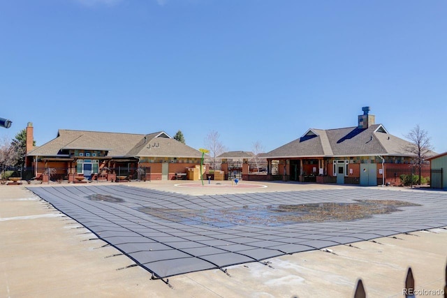 view of pool with fence