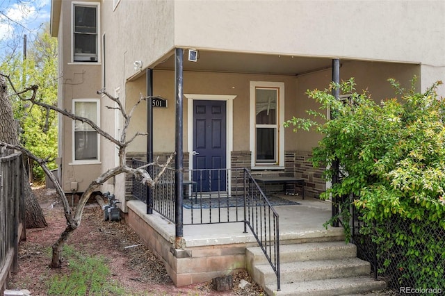 501 N Weber, Colorado Springs, CO 80903 - entrance to property featuring stucco siding and covered porch