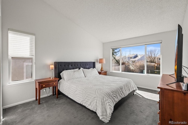 bedroom with carpet, baseboards, vaulted ceiling, and a textured ceiling