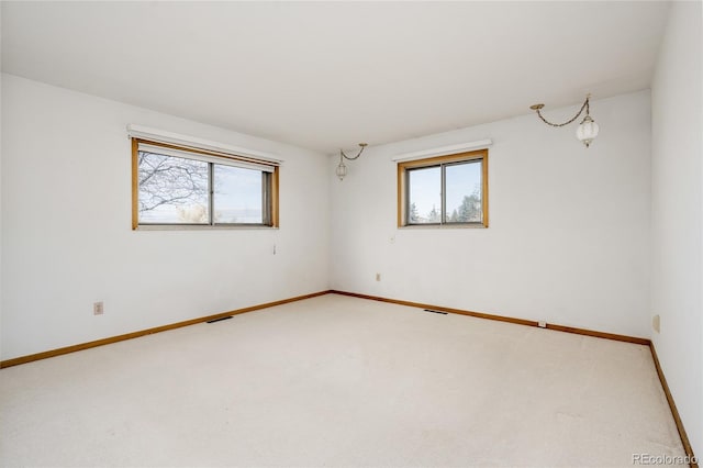 8895 Morton Rd, Niwot, CO 80503 - carpeted empty room with plenty of natural light