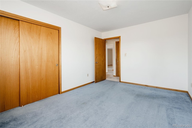 8895 Morton Rd, Niwot, CO 80503 - unfurnished bedroom with carpet flooring and a closet