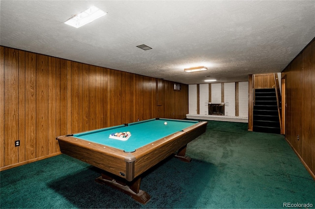 8895 Morton Rd, Niwot, CO 80503 - recreation room with wooden walls, carpet floors, billiards table, and a textured ceiling