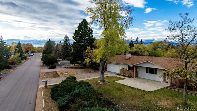 8895 Morton Rd, Niwot, CO 80503 - exterior space with a garage and driveway