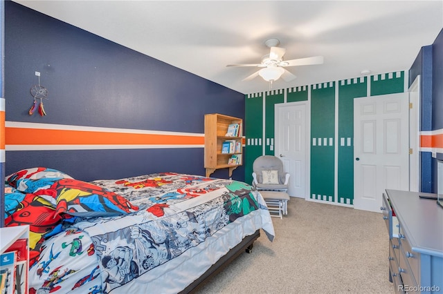 carpeted bedroom featuring ceiling fan