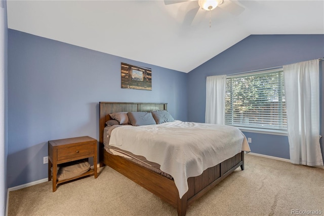 carpeted bedroom featuring ceiling fan and lofted ceiling