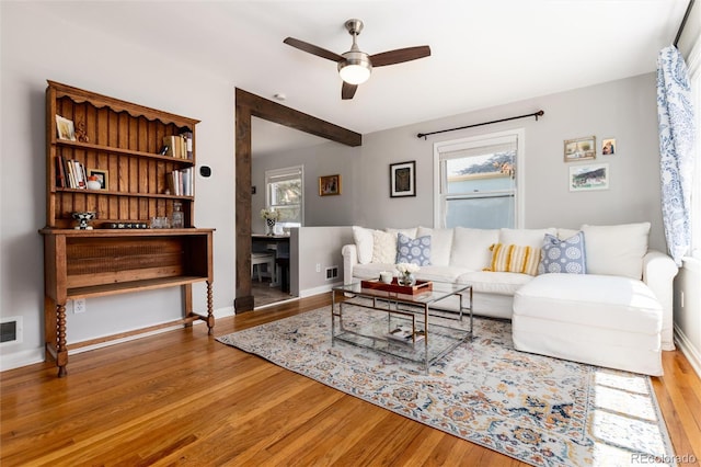 916 E Ln Salle St, Colorado Springs, CO 80907 - living room with wood finished floors, ceiling fan, and baseboards
