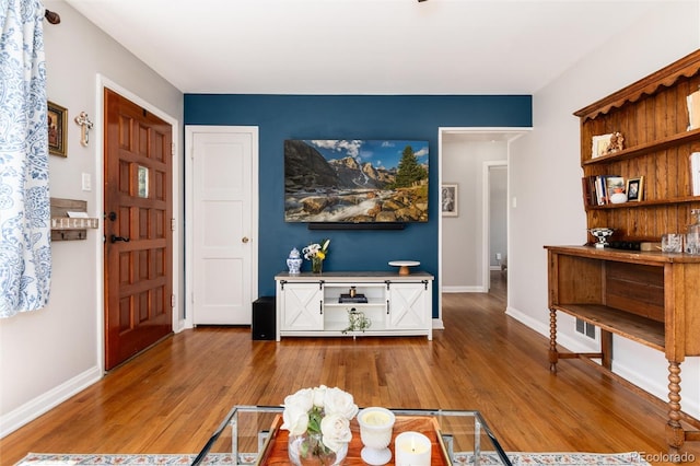 916 E Ln Salle St, Colorado Springs, CO 80907 - foyer featuring wood finished floors and baseboards