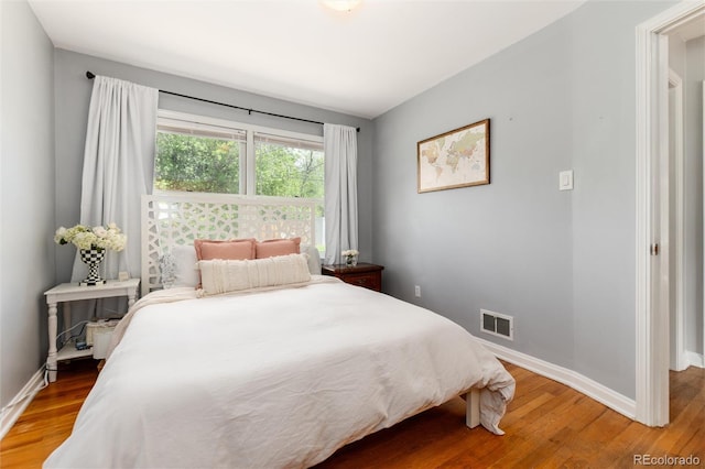 916 E Ln Salle St, Colorado Springs, CO 80907 - bedroom with light wood-style floors and baseboards