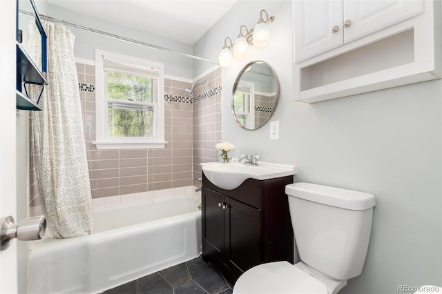 916 E Ln Salle St, Colorado Springs, CO 80907 - full bath featuring toilet, tile patterned floors, vanity, and shower / bath combo