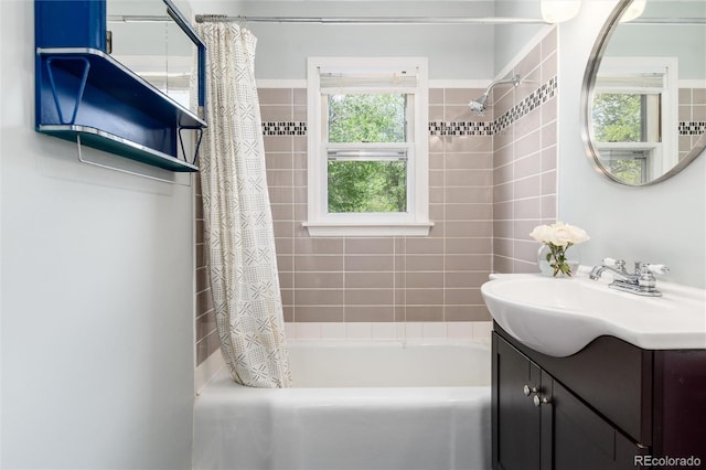 916 E Ln Salle St, Colorado Springs, CO 80907 - bathroom featuring shower / tub combo with curtain and vanity