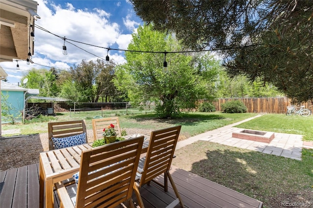 916 E Ln Salle St, Colorado Springs, CO 80907 - wooden deck with a patio area and outdoor dining space