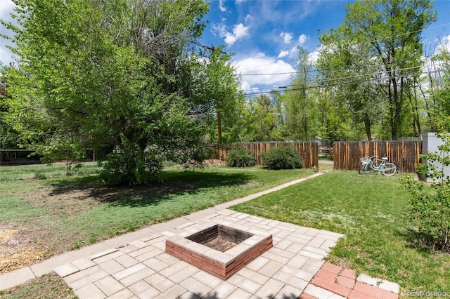 916 E Ln Salle St, Colorado Springs, CO 80907 - view of yard featuring a fire pit and a patio area