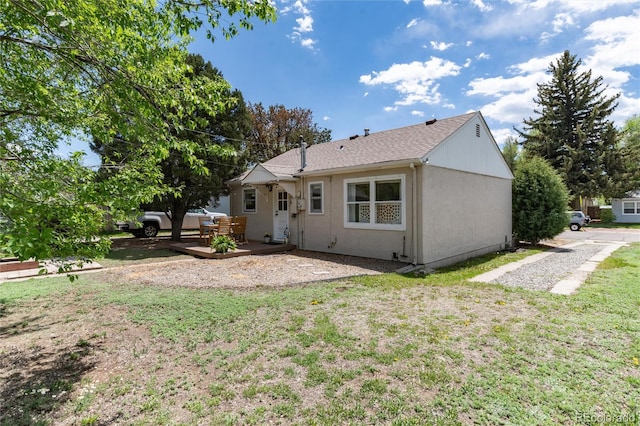 916 E Ln Salle St, Colorado Springs, CO 80907 - rear view of property with a patio and stucco siding