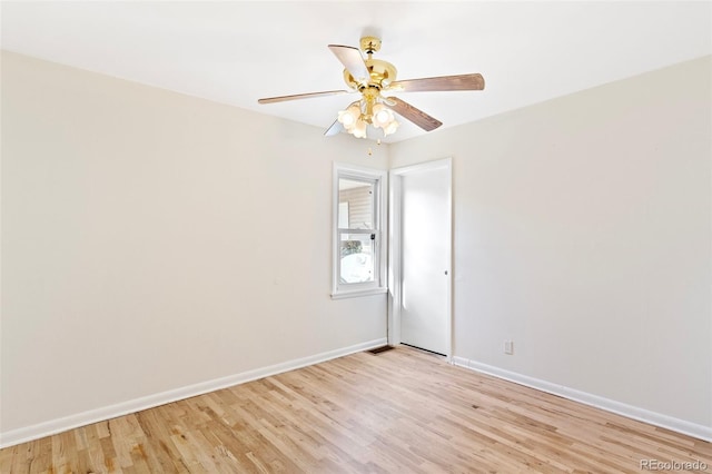 empty room with light hardwood / wood-style flooring and ceiling fan