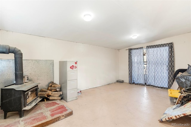 basement featuring a wood stove