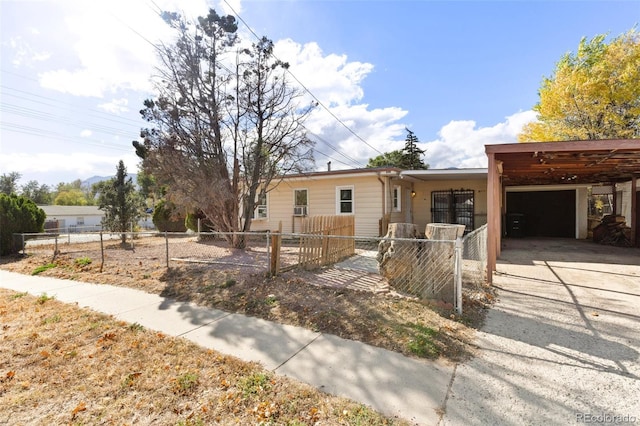 view of front of home with a carport