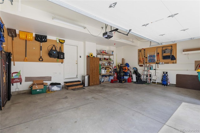 10183 Grove Loop Unit D, Westminster, CO 80031 - garage featuring a garage door opener