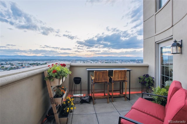 view of balcony at dusk