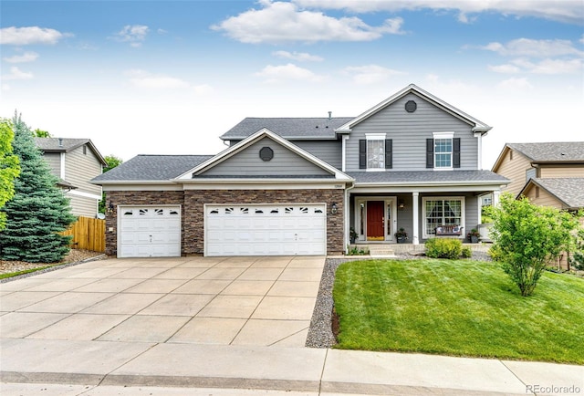 12000 Horseshoe Ln, Parker, CO 80138 - traditional home featuring covered porch, driveway, an attached garage, and a shingled roof