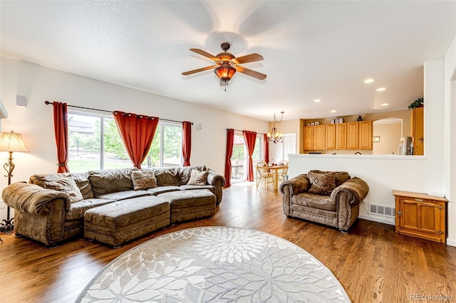 12000 Horseshoe Ln, Parker, CO 80138 - living area with a ceiling fan, dark wood-style floors, recessed lighting, and a chandelier