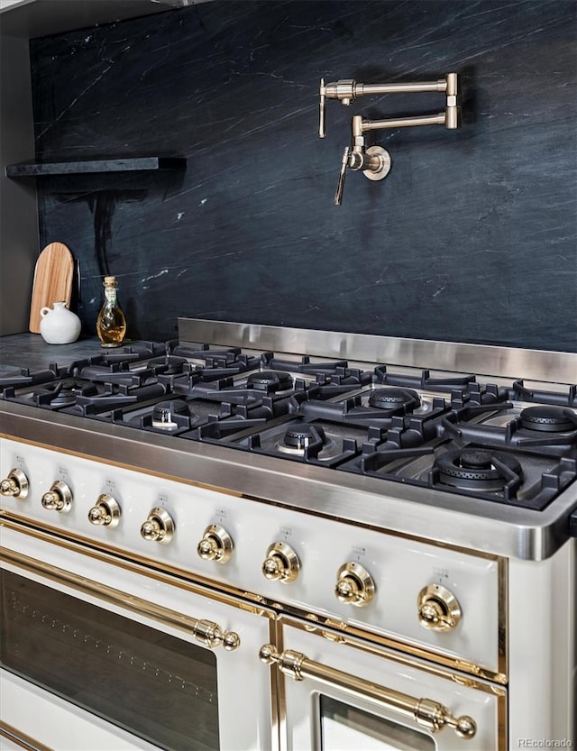 5290 Nassau Cir E, Cherry Hills Village, CO 80113 - details featuring backsplash and cooktop