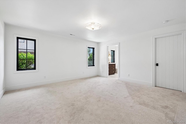 5290 Nassau Cir E, Cherry Hills Village, CO 80113 - carpeted spare room featuring baseboards, plenty of natural light, and visible vents