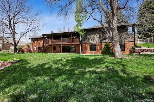 5290 Nassau Cir E, Cherry Hills Village, CO 80113 - rear view of house with a yard, a deck, fence, brick siding, and stairs