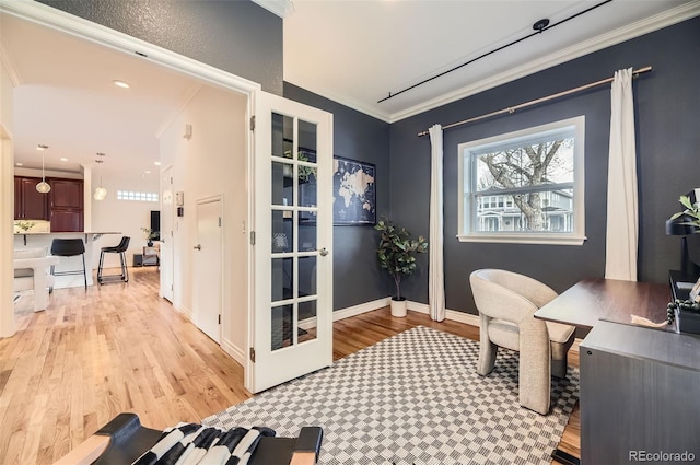 office featuring crown molding and light wood-type flooring