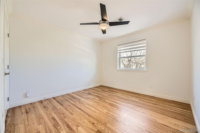 unfurnished room with ornamental molding, ceiling fan, and light hardwood / wood-style flooring