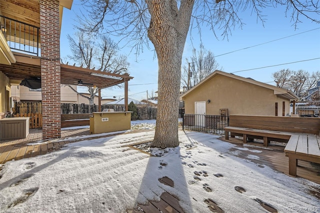 view of snow covered deck