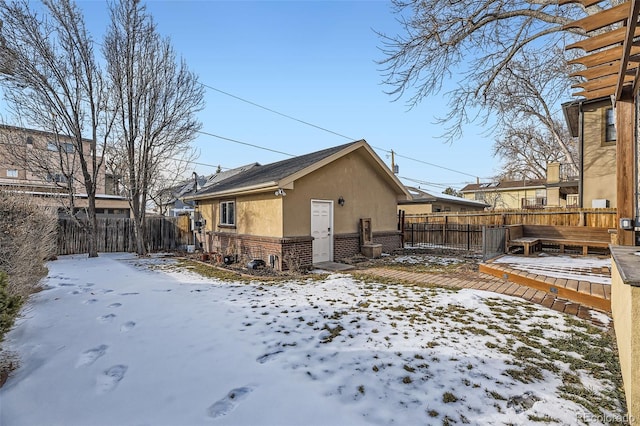 view of snow covered property