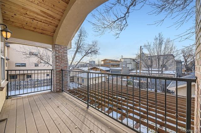 view of snow covered deck