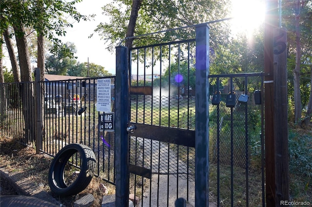 view of gate with a water view