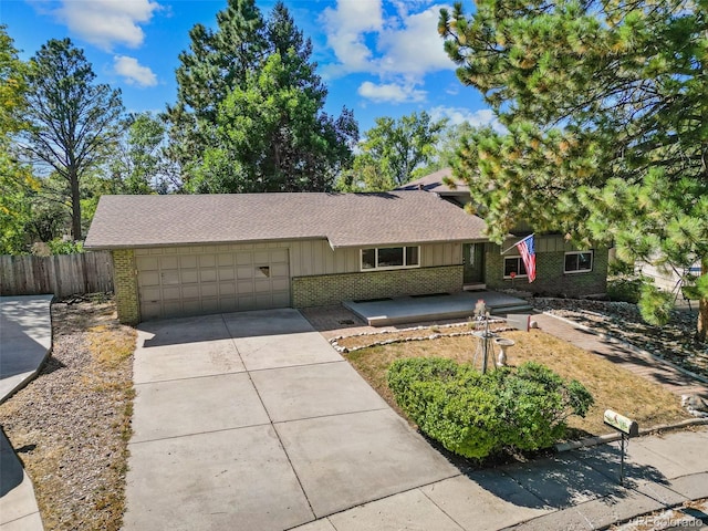 ranch-style house featuring a garage