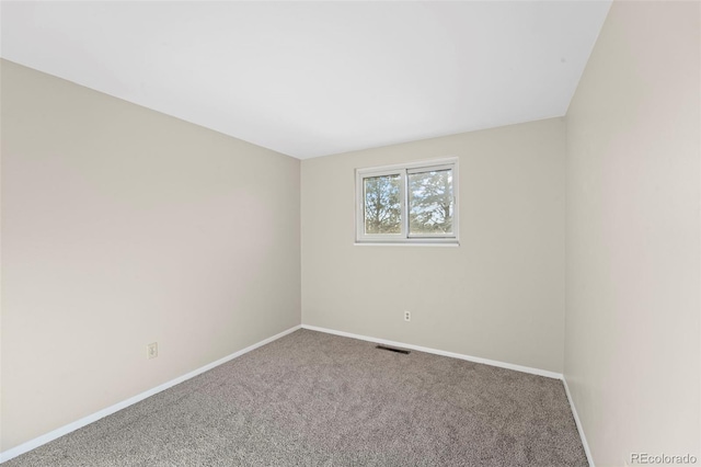 view of carpeted spare room