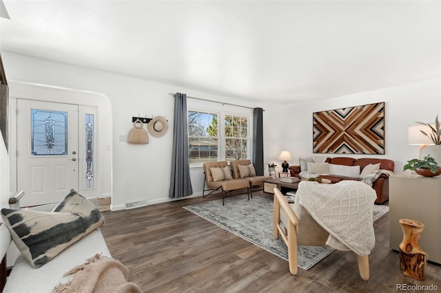 living room featuring dark hardwood / wood-style floors