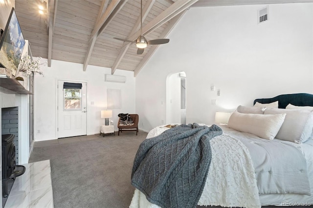 carpeted bedroom featuring wood ceiling, high vaulted ceiling, a brick fireplace, ceiling fan, and beam ceiling