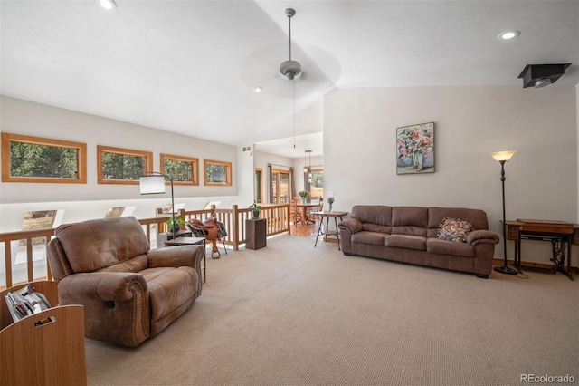1740 County Road 72, Bailey, CO 80421 - living area with recessed lighting, lofted ceiling, a wealth of natural light, and light carpet