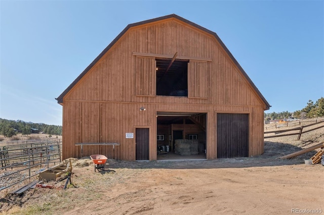 1740 County Road 72, Bailey, CO 80421 - view of outdoor structure featuring an exterior structure, fence, and an outbuilding