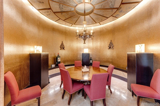 dining space featuring a notable chandelier