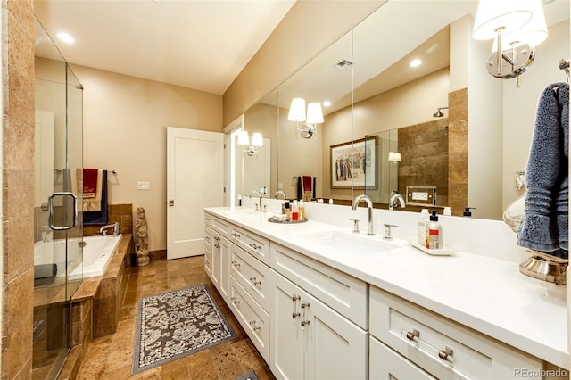 bathroom featuring vanity and plus walk in shower