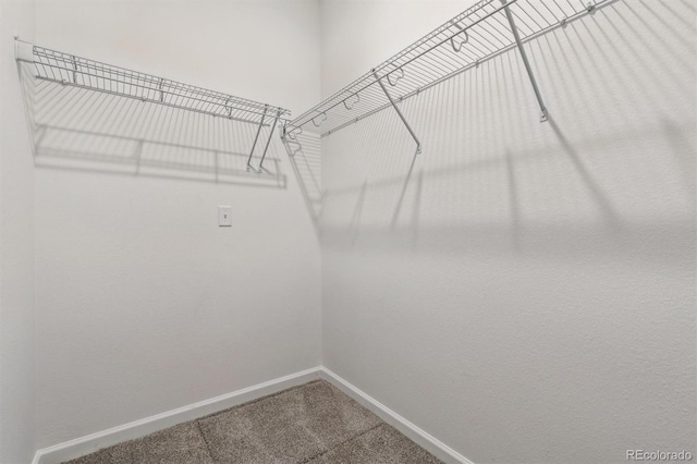 9662 Cathay St, Commerce City, CO 80022 - spacious closet with carpet floors