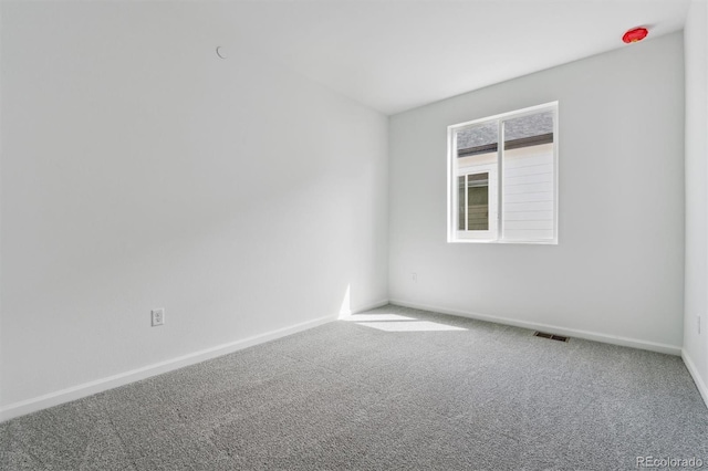 9662 Cathay St, Commerce City, CO 80022 - carpeted spare room featuring visible vents and baseboards