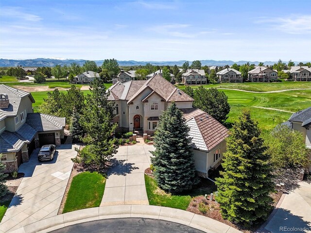 1287 Buffalo Ridge Rd, Castle Pines, CO 80108 - aerial view of residential area with a mountain backdrop