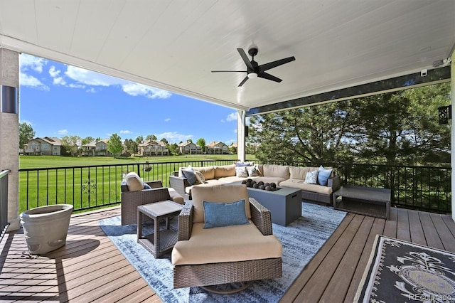 1287 Buffalo Ridge Rd, Castle Pines, CO 80108 - wooden deck with outdoor lounge area, ceiling fan, a residential view, and a yard