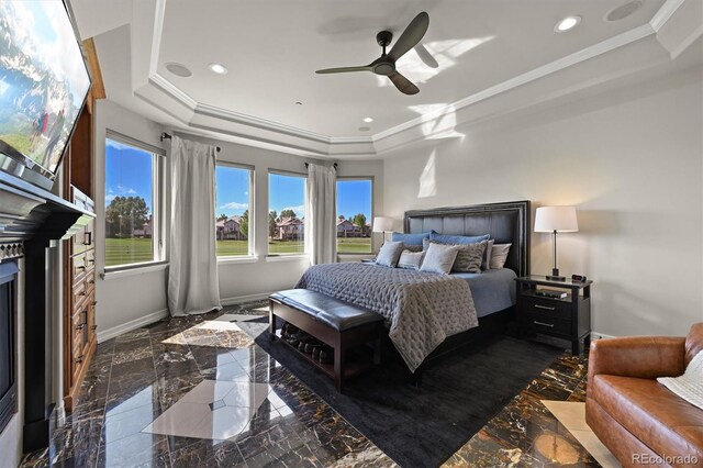 1287 Buffalo Ridge Rd, Castle Pines, CO 80108 - bedroom with a tray ceiling, baseboards, recessed lighting, ornamental molding, and marble tiled floors