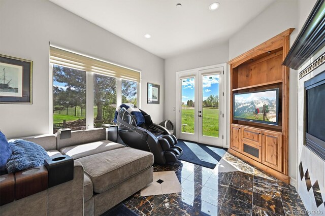 1287 Buffalo Ridge Rd, Castle Pines, CO 80108 - living area with marble tiled flooring and recessed lighting