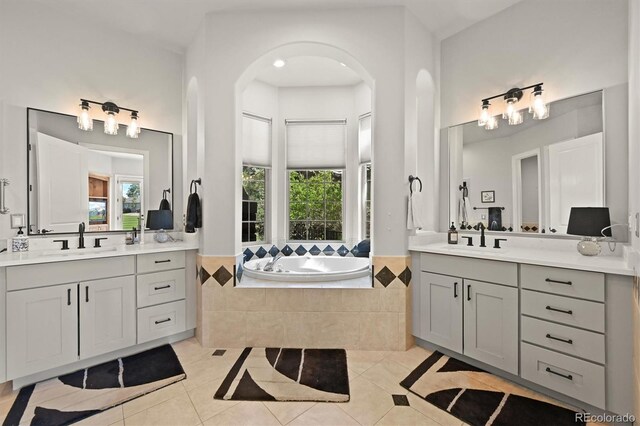 1287 Buffalo Ridge Rd, Castle Pines, CO 80108 - bathroom with tile patterned floors, healthy amount of natural light, and two vanities