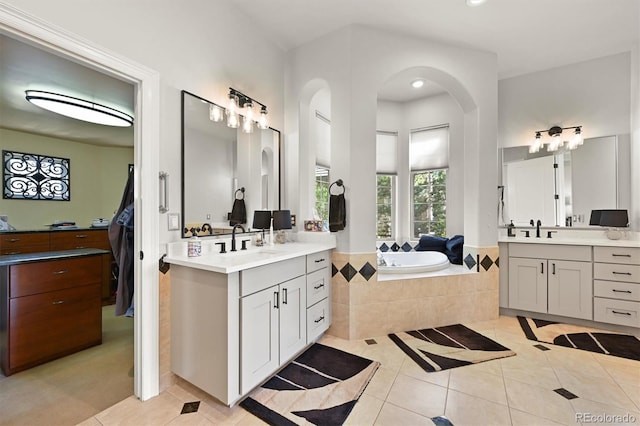 1287 Buffalo Ridge Rd, Castle Pines, CO 80108 - full bath featuring tile patterned flooring, two vanities, a bath, and recessed lighting