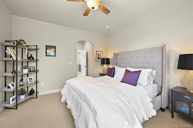 1287 Buffalo Ridge Rd, Castle Pines, CO 80108 - carpeted bedroom featuring arched walkways, baseboards, and ceiling fan